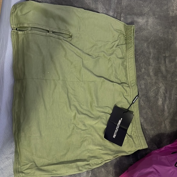 Selling a Sage Khaki Cotton Cut Out Side
Micro Mini Skirt - Picture 2 of 3
